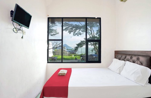 Singkawang Hotel | Comfortable Stay at OYO 92609 Guest House Malay Singkawang