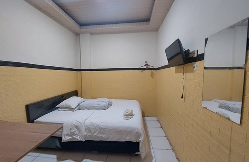 Kotaraja Hotel | Budget-Friendly Kharis Home Stay with Breakfast Included