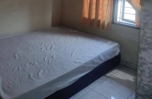 Cikarang Hotel | Budget-Friendly Stay at OYO 93836 Budi Residence