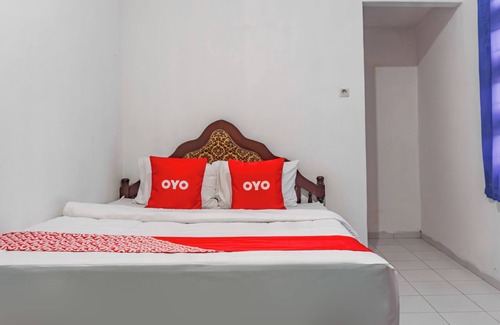 Kotabumi Hotel | Budget-Friendly Stay at OYO 93902 Guest House Pahlawan