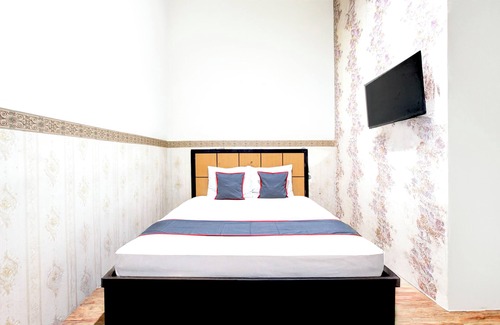 Tegal Hotel | OYO 94512 Mega Inn Guest House