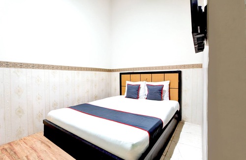 Tegal Hotel | OYO 94512 Mega Inn Guest House