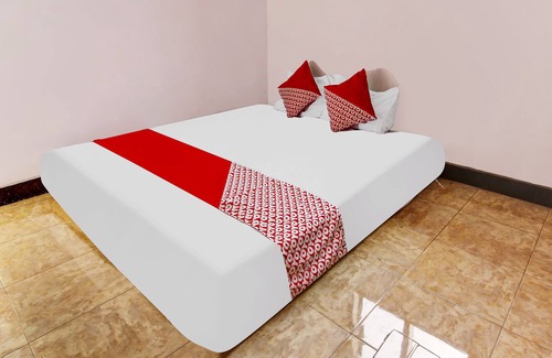 Trenggalek Hotel | Explore OYO Homes 91134 with Breakfast & Family-Friendly Fun