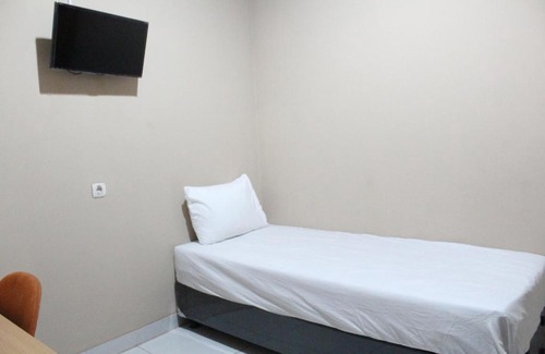 Depok Hotel | Budget-Friendly Child-Friendly Stay at Raihan Residence