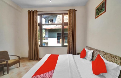 Bajaura Hotel | Budget-Friendly OYO Rudhra River Huts with Breakfast Included