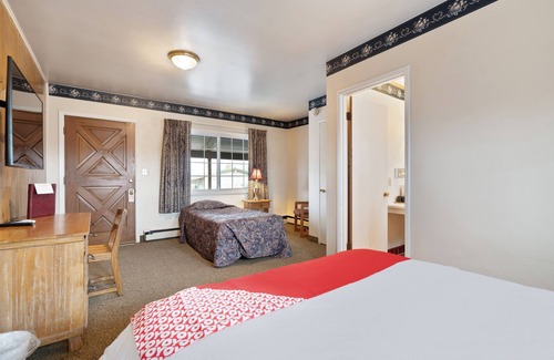 Burns Hotel | Budget-Friendly OYO Silver Spur with Breakfast & Kitchen