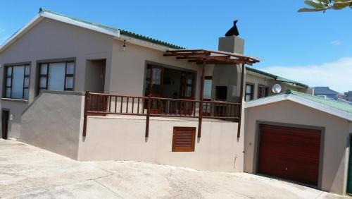 Cape Saint Francis House | Explore Oyster Catcher: Oceanfront Stay with Spa & Breakfast