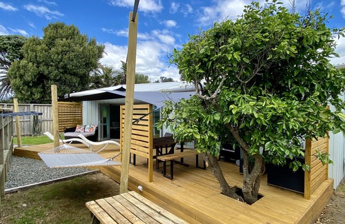 Ohope House | Oystercatcher Bach: Oceanfront Retreat with Pool & Breakfast
