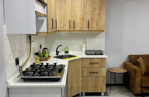 Durusu Apartment | Convenient Ozn Suit Airport with Breakfast & Family Amenities