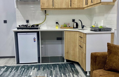 Durusu Apartment | Convenient Ozn Suit Airport with Breakfast & Family Amenities