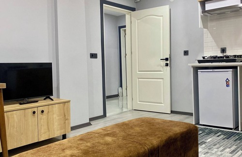 Durusu Apartment | Convenient Ozn Suit Airport with Breakfast & Family Amenities