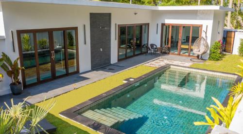 Wok Tum Villa | Experience Ozzy Villa Phangan: 4-Star Family Retreat