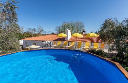 Nossa Senhora da Tourega House | Discover Páteo Lima: Oceanfront Retreat with Pool Access