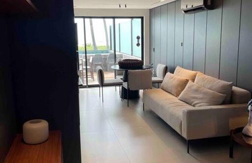 Jardim Oceania Apartment | Beachfront Escape with Private Pool and Ocean Views