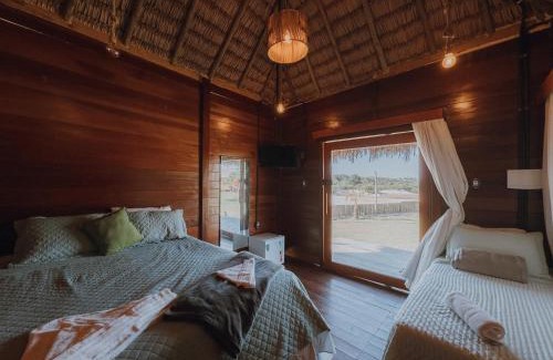 Santo Amaro do Maranhao Cabin | Inviting Pacas Suítes Casa & Chalés: Pet-Friendly Stay