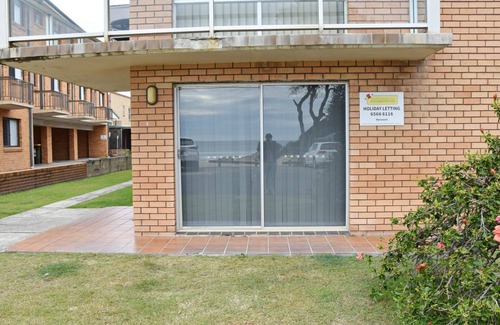 South West Rocks Apartment | Pacific Court 1: Steps from the Beach with Ocean Views