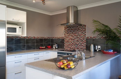 Papamoa Beach Apartment | Experience Pacific Palms Resort with Ocean Views & Spa