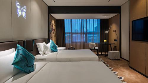 Guangzhou Hotel | Eco-Friendly Stay at Paco Hotel Chebeinan Metro Guangzhou