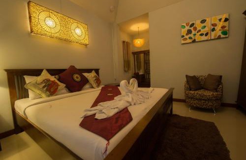 Thani Hotel | Relax at Pai Sukhothai Resort with Pool and Family Amenities