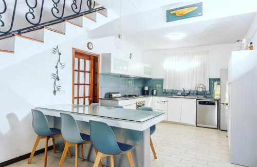 Grande Riviere Noire Villa | Relax at PAILLE EN QUEUE with Heated Pool & Ocean Views