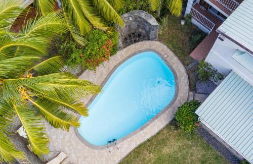 Grande Riviere Noire Villa | Relax at PAILLE EN QUEUE with Heated Pool & Ocean Views