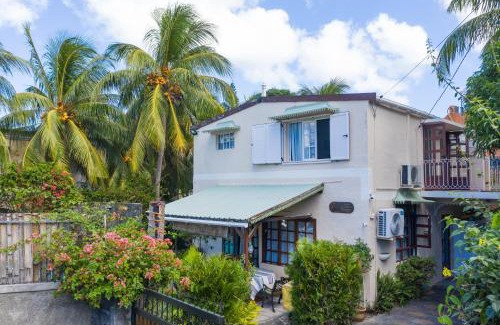 Grande Riviere Noire Villa | Relax at PAILLE EN QUEUE with Heated Pool & Ocean Views