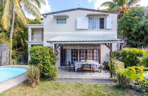 Grande Riviere Noire Villa | Relax at PAILLE EN QUEUE with Heated Pool & Ocean Views