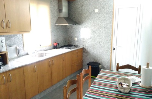 Valdovino House | Charming Painted Beach House in Pantín with Family Amenities