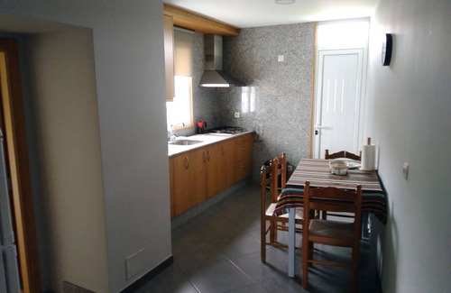 Valdovino House | Charming Painted Beach House in Pantín with Family Amenities