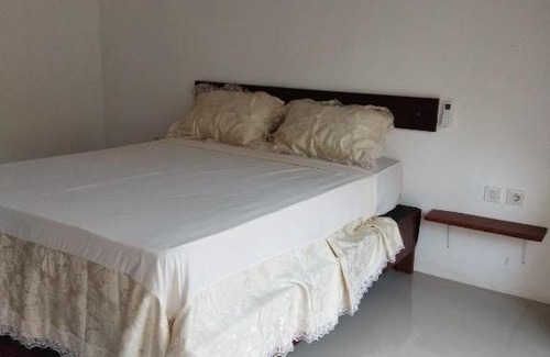 Kuta House | Pet-Friendly Pakok Homestay: Your Cozy Budget Retreat