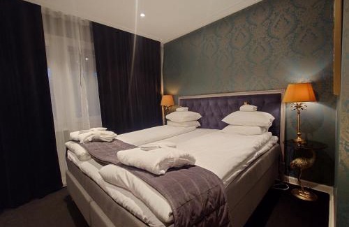 Hultsfred Hotel | Pet-Friendly Palace Hotel: Family Amenities & Relaxing Hot Tub
