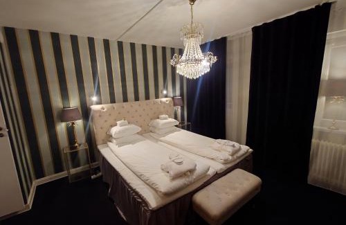 Hultsfred Hotel | Pet-Friendly Palace Hotel: Family Amenities & Relaxing Hot Tub