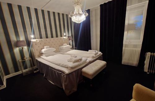 Hultsfred Hotel | Pet-Friendly Palace Hotel: Family Amenities & Relaxing Hot Tub