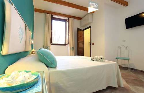 Alghero City Centre House | Eco-Friendly Retreat at Palau De Rosa – Rated 9.6/10