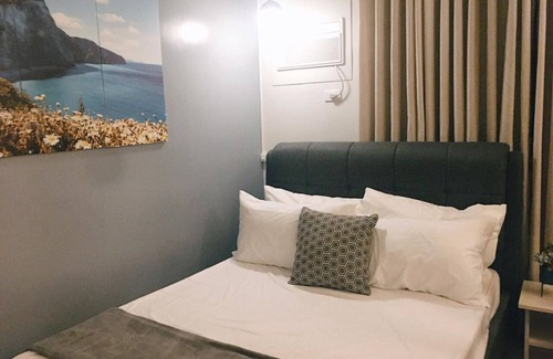 Puerto Princesa City Centre Condo | Pet-Friendly Palawan Condo Suite with Free Gym Access