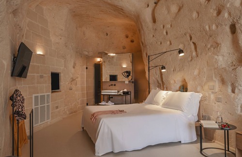 Sasso Barisano Hotel | Experience Palazzo degli Abati: Rated 9.8 with Spa & Family Comfort
