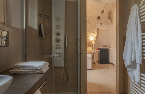 Sasso Barisano Hotel | Experience Palazzo degli Abati: Rated 9.8 with Spa & Family Comfort