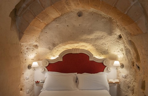 Sasso Barisano Hotel | Experience Palazzo degli Abati: Rated 9.8 with Spa & Family Comfort