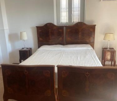 Civitavecchia House | Elegant Palazzo Podestà: Oceanfront Pool & High Ratings