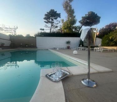 Civitavecchia House | Elegant Palazzo Podestà: Oceanfront Pool & High Ratings