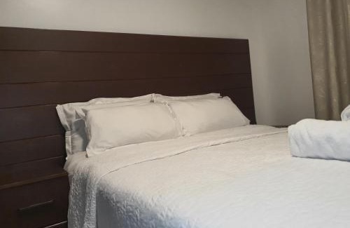 Kireka Apartment | Delightful Palm and Emerald Homes: Rated 10/10 with Pool