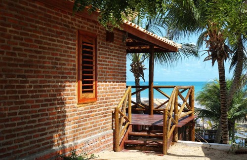 Acarai Hotel | Discover Palm Beach Chalés & Restô: Oceanfront Retreat
