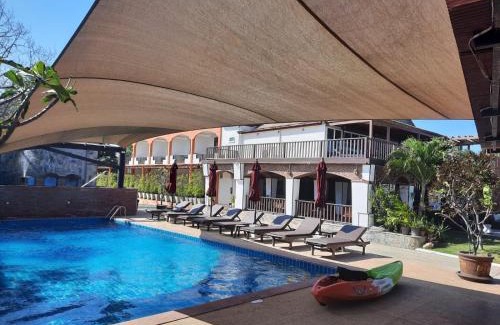 Pak Nam Pran Resort | Idyllic Palm Beach Resort with Pool and Ocean Views