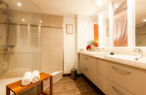 Orient Bay Hotel | Elegant Palm Court Residence with Ocean View & Spa Amenities