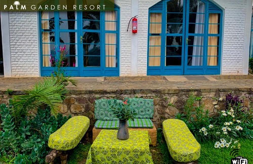 Gisenyi Cabin | Welcoming Palm Garden Lodge: Family-Friendly & Accessible Stay