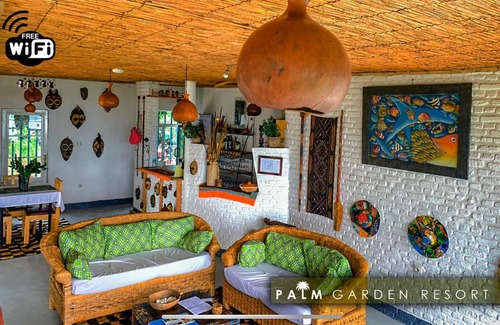 Gisenyi Cabin | Welcoming Palm Garden Lodge: Family-Friendly & Accessible Stay