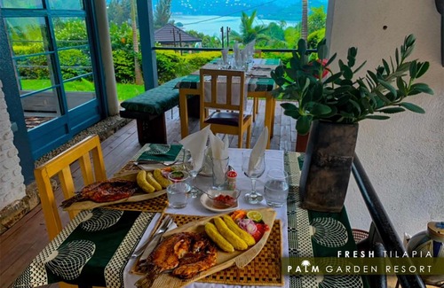 Gisenyi Cabin | Welcoming Palm Garden Lodge: Family-Friendly & Accessible Stay