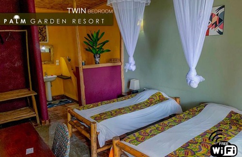 Gisenyi Cabin | Welcoming Palm Garden Lodge: Family-Friendly & Accessible Stay
