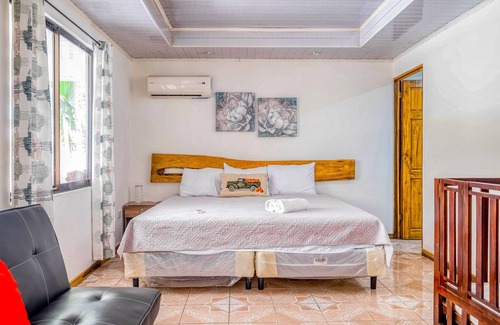 Garabito House | Escape to a Pet-Friendly Oasis with Pool and Mountain Views