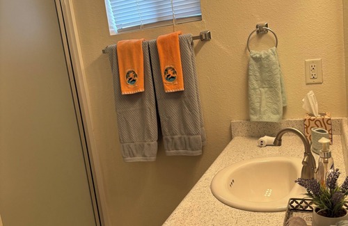 Lemoore House | Discover Palm Oasis: Top-Rated Stay with Pool & Breakfast